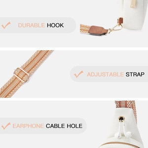 Detail of durable metal hooks, adjustable pattern strap, and earphone port on white canvas bag