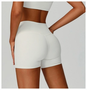 Detailed back view of high-waisted ribbed yoga shorts with tummy control and lifting effect
