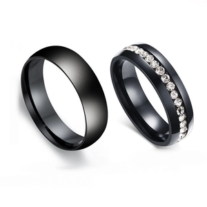 Polished black 316L stainless steel couple rings set featuring a sparkling crystal inlay