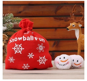 Close-up of a red Snowball Fun drawstring bag with cute embroidered plush snowballs