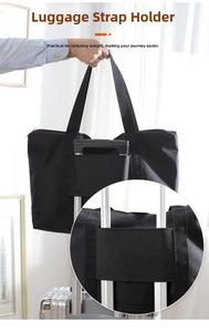 Practical trolley sleeve detail on a durable black travel bag for easy luggage attachment