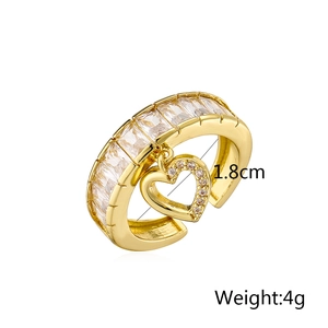 Detail of gold heart ring with baguette zircons showing 1.8cm inner diameter and 4g weight