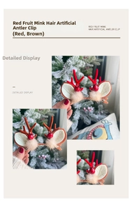 Detail of Christmas reindeer antler hair clip with fuzzy pompom and red berry accents