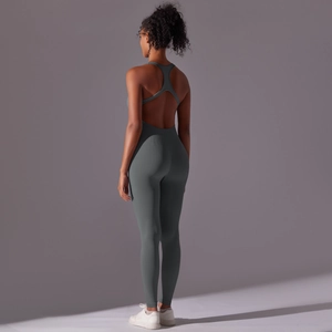 Detailed back view of a slim-fit backless yoga jumpsuit in dark grey-green