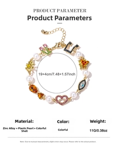 Detailed view of the multi-pendant charm bracelet with OT buckle and colorful mixed charms
