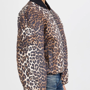 Fashionable leopard print bomber jacket with black ribbed trim shown on model sideways
