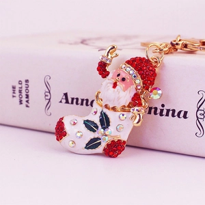 Sparkling Santa boot and stocking keychain with red rhinestones and golden lobster clasp