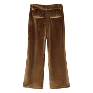 Elegant velvet flared trousers in bronze brown, showing the back view on white background