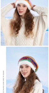 Detailed view of colorful striped plush beanie with fuzzy brim and metal brand label