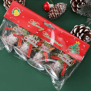 6-piece set of red and silver Christmas decorative bells with pine cones on dark green background