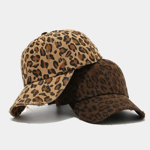 Vintage leopard print baseball caps with distressed brim in tan and brown tones