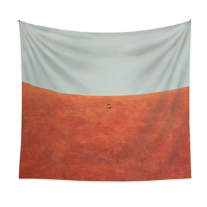Detail showing the woven texture and minimalist landscape design on the wall tapestry