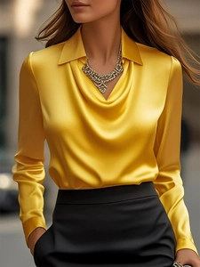 Elegant bright yellow satin shirt for women with cowl neck and silky smooth finish