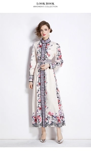 Detail of vintage floral print maxi dress with stand collar and matching waist belt