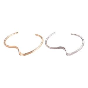 Minimalist irregular geometric twisted open cuff bracelets in polished gold and silver