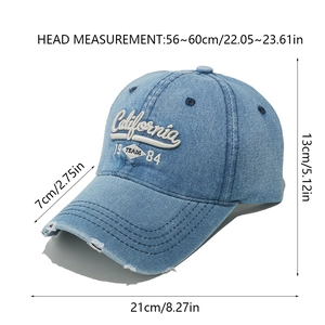 Detail of California embroidery on blue washed denim baseball cap with size labels