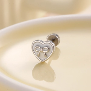 Elegant white enamel heart bow stud earring in titanium steel with a sleek mirror reflection