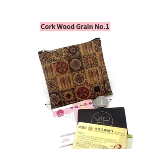 Detailed view of square cork coin purse with retro geometric flower and fish patterns