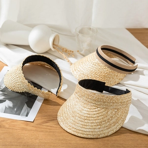Three minimalist straw sun visors with various edge textures for outdoor summer sun protection