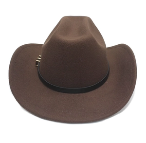 Close-up of brown wool felt cowboy hat with black band and gold rectangular buckle
