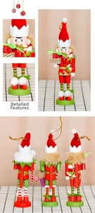 Close-up of 13cm wooden nutcracker ornaments with hand-painted details and gold hanging cords
