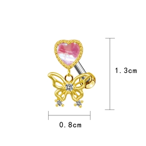 Macro shot of pink heart zircon and gold butterfly navel piercing with size metrics