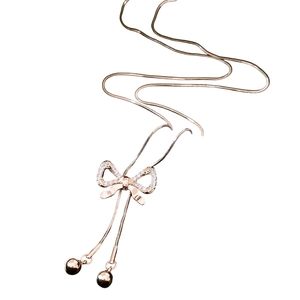 Rose gold bow pendant necklace with zircons and adjustable long chain for women