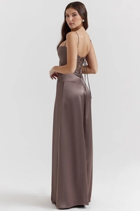 Detail of taupe satin evening dress showing the criss-cross corset tie back and open back