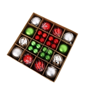 Assorted Christmas ornaments set with snowflake patterns and textures in a craft gift box