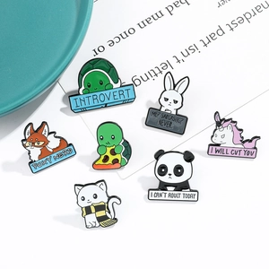 Close-up of cute cartoon enamel animal pins with witty quotes on zinc alloy badges