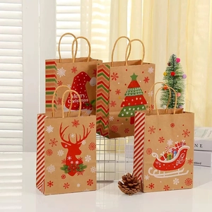 Set of 4 Christmas kraft paper gift bags featuring Santa, reindeer, and tree designs