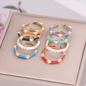 Set of colorful enamel bamboo rings in gold finish with sparkling zircon stones
