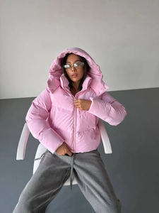 Women's warm hooded pink puffer jacket with quilted design and full zipper closure