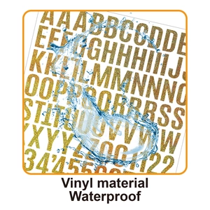 Close-up of waterproof vinyl alphabet and number stickers with water splash effect