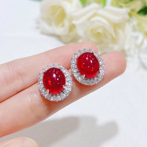 Pigeon blood ruby jewelry set with oval red gemstone earrings and clear zircon halo