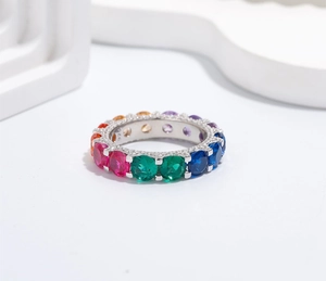Macro shot of colorful cubic zirconia stones and S925 hallmark on the silver ring band
