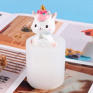 Silicone unicorn mold for DIY candles and resin art shown with a finished cute figure