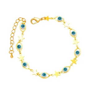 Detail of evil eye and star link bracelet with adjustable lobster clasp in gold finish