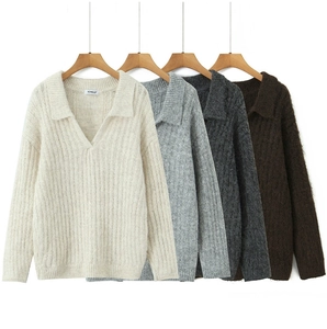 Detailed vertical rib knit texture of long sleeve V-neck polo sweaters in four colors