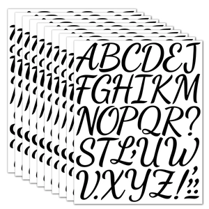 Close-up of waterproof black alphabet stickers in brush-stroke font for DIY journals