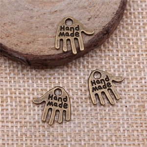 Three antique bronze hand-shaped pendants with 'Hand made' engraving for DIY jewelry