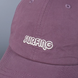 Deep purple washed cotton baseball cap featuring high-quality white SURFING embroidery
