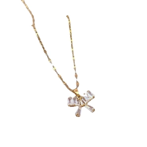 Elegant gold titanium necklace featuring a sparkling zircon butterfly pendant on a link chain