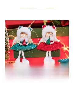 Detail of plush Christmas tree angel doll ornaments with white faux fur and polka dot skirts