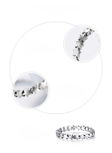 Detail of S925 sterling silver ring featuring star pattern and oxidized finish