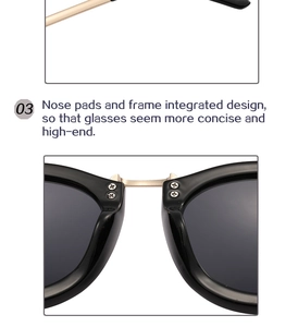 Detail of integrated nose pads with black resin frame and golden metal bridge