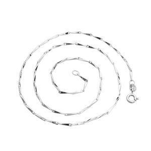 Elegant S925 sterling silver twist link chain necklace coiled on white background