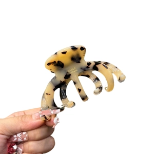 French elegant acetate leopard print hair claw clip with handmade gold logo mark
