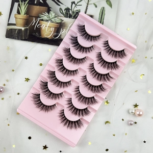 Set of 10 pairs thick long black false eyelashes on pink tray with ins style background