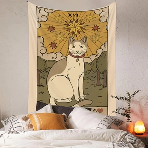 Bohemian Tarot Cat tapestry hanging on a white brick wall in a cozy bedroom setting